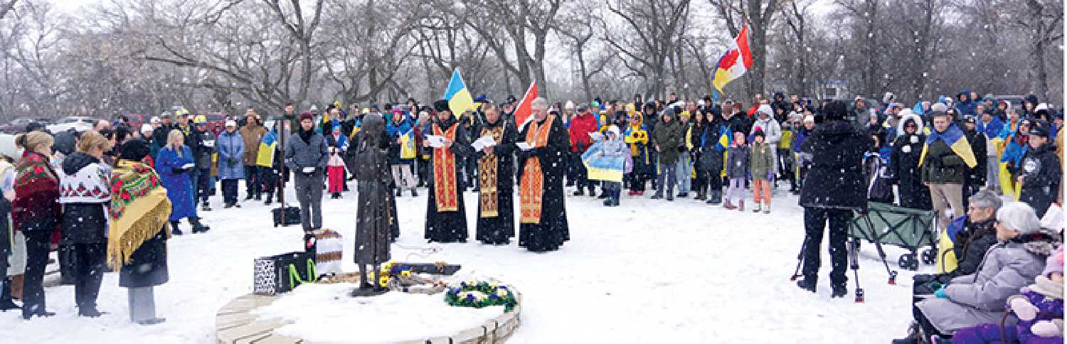 A large group gathered at the Holodomor memorial near the Legislative Building in Regina on Feb. 24, marking the two-year anniversary of the Russian invasion of Ukraine.